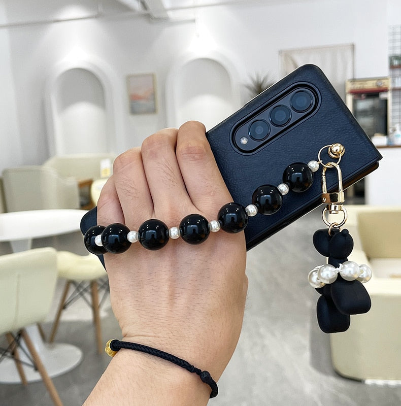 Cute Beads Wrist Band Abstract Balloon DogPhone Case For Samsung Galaxy Z Fold 3