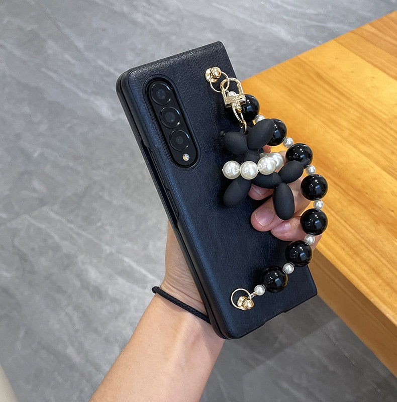 Cute Beads Wrist Band Abstract Balloon DogPhone Case For Samsung Galaxy Z Fold 3