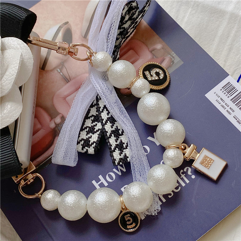 Luxury Leather Camellia Elegant Pearl Bracelet Phone Case For Samsung Galaxy Z Flip 3
